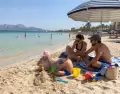 Al amanecer, las playas amplias y poco profundas son ideales para familias con ni�os peque�os.